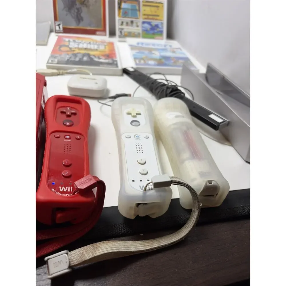 Nintendo Wii 25th Anniversary Red Console Bundle, 3 Remotes, 4 Games ,2 Nunchuk